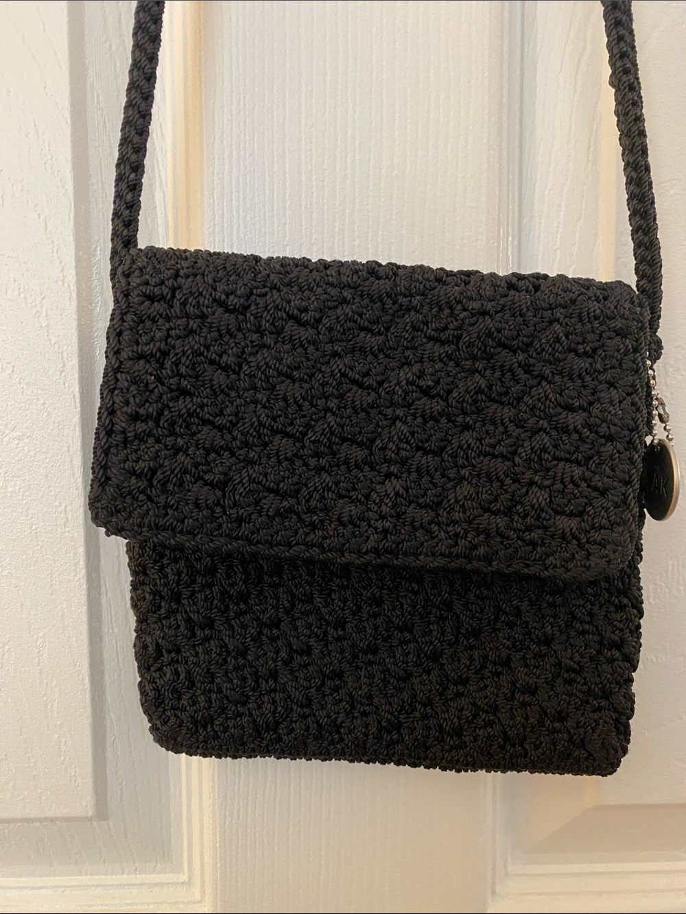 The Sak Black Crochet Fold-Over Crossbody Bag